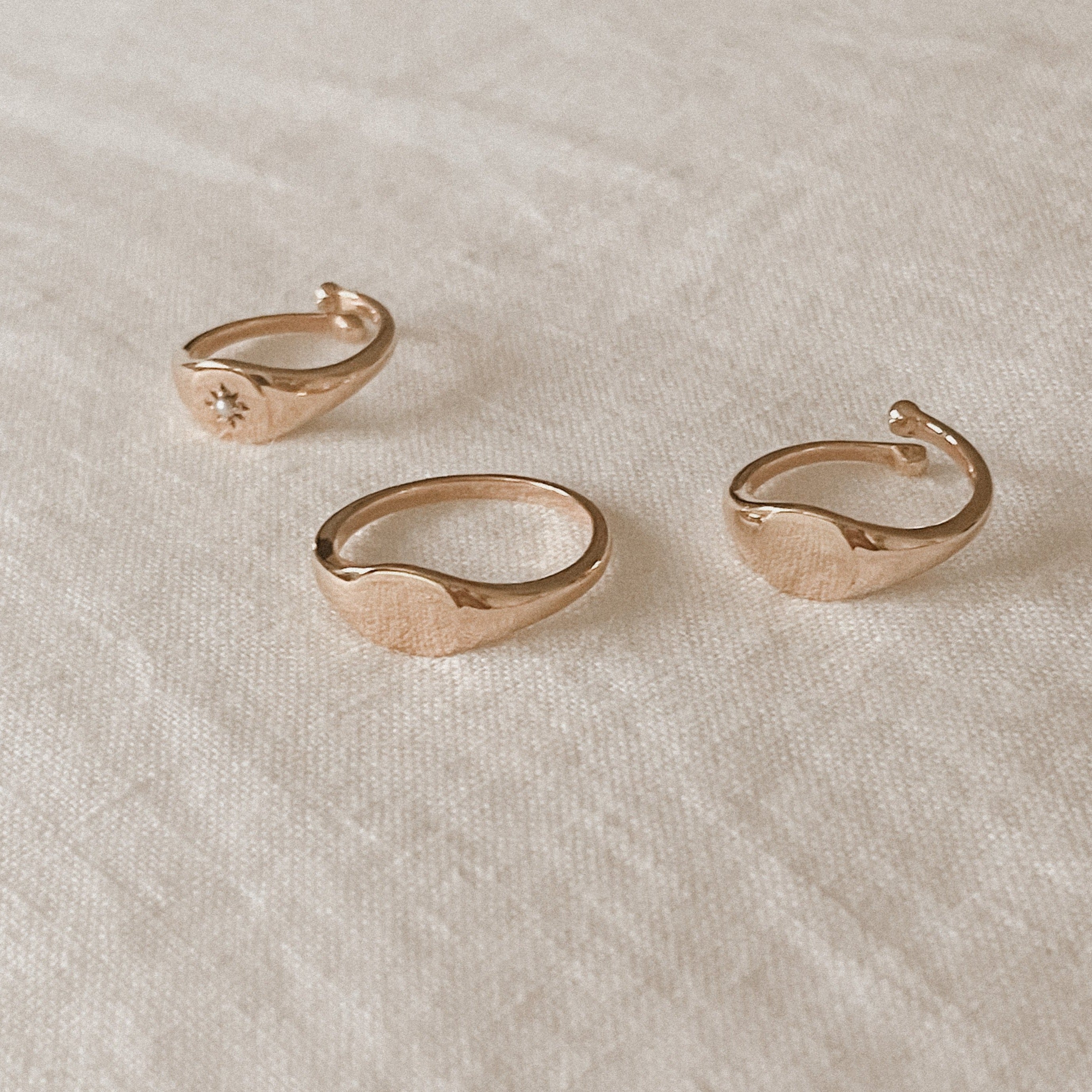 A solid 9ct Rose Gold signet ring in two different adult ring sizes.  Ethically made by fairtrade artisans.