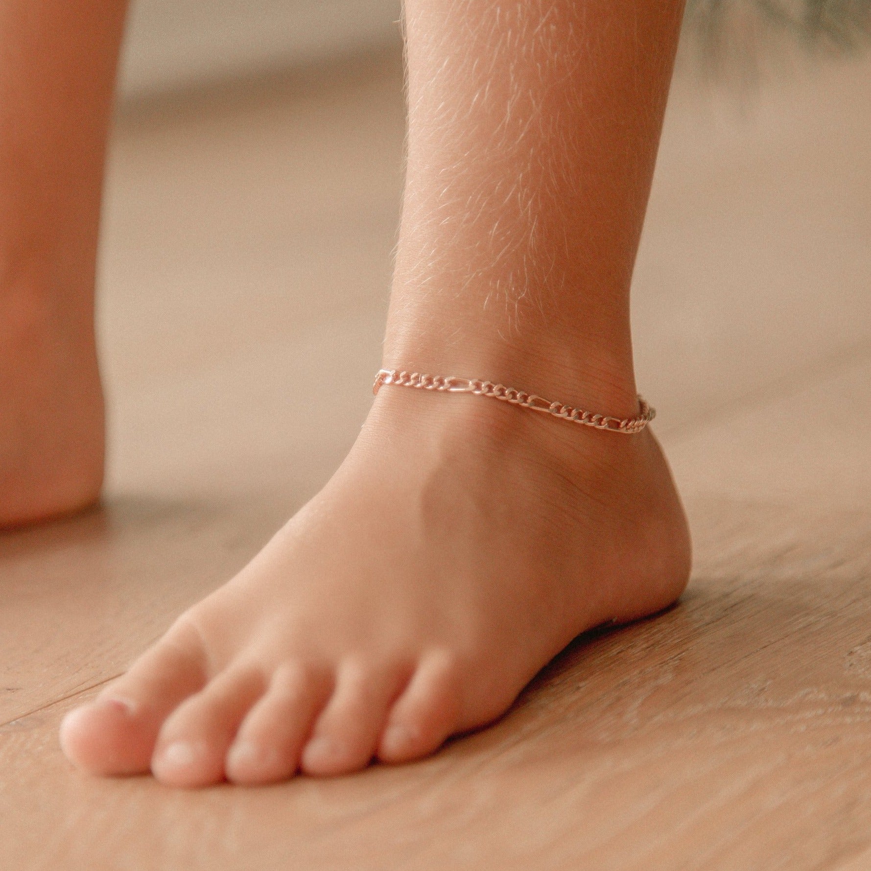 Rose Gold Vermeil Figaro Anklet is worn by a young girl.